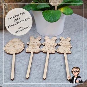 Op de afbeelding: Houten paas cake toppers en bloemenstokken. De set bevat een eivormige topper met hartmotieven en drie konijnvormige toppers. De tekst op het label luidt "CAKETOPPER ODER BLUMENSTECKER INKL. GEWERBELIZENZ."