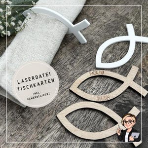 Könnte beinhalten: Tischkarten in Fischform aus Holz mit dem Namen "Magdalena" und dem Datum "21.08.2024" graviert. Ein weißer Serviettenhalter in Kreuzform ist ebenfalls zu sehen. Der Text "LASERDATEI TISCHKARTEN" ist enthalten.