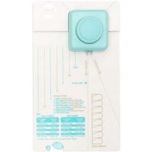 May include: A white and light blue paper crafting tool with a turquoise punch. The tool features inch and cm charts for flower sizes, along with directions and a start line. The tool is designed for creating paper flowers.