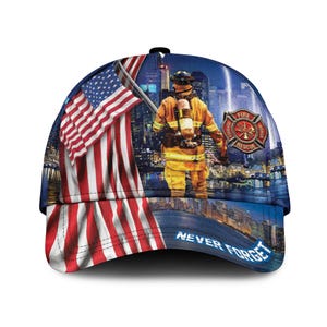 May include: A baseball cap featuring a graphic print of a firefighter in yellow gear standing before a city skyline at night, an American flag, a Fire Rescue emblem, and the text NEVER FORGET printed in blue on the lower front panel.