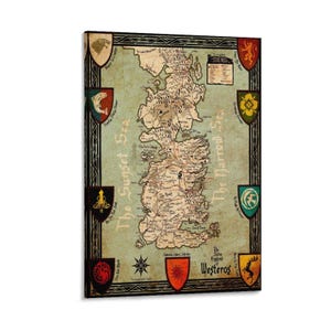 May include: A framed map of Westeros, featuring a detailed depiction of the fictional continent. The map is surrounded by decorative shields and a black border. The map includes the text "The Sunset Sea" and "The Narrow Sea".