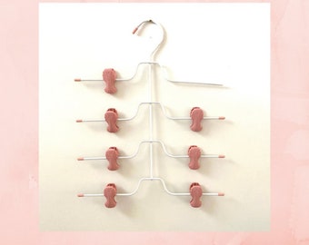 Old Fashioned Clothespin Hanger for Undergarments - Cute Pink Plastic Pins on a White Hanger