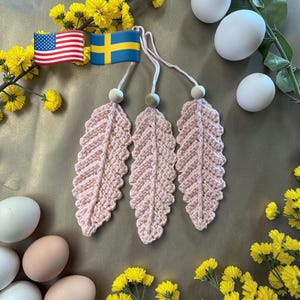 May include: A set of three ceramic mugs with a speckled, matte finish. The mugs are in shades of cream, light gray, and dark gray. Each mug has a simple, minimalist design, perfect for coffee or tea.