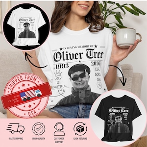 Pode incluir: Uma t-shirt branca com um retrato a preto e branco de Oliver Tree com o texto In Loving Memory of Oliver Tree 1993 2026, Ugly is Beautiful e Life Goes On. O design inclui uma coroa, um coração e um ícone de cara triste.