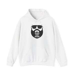May include: White hooded sweatshirt with a black graphic of a bearded face wearing sunglasses. The text "BEARDED CHUBBY AWESOME" is printed below the beard. The sweatshirt has a front pocket and a drawstring hood.