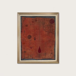 May include: Framed abstract artwork with a gold-colored frame. The artwork features a reddish-brown background with black and red shapes, including circles and lines, creating a minimalist design. The piece has a textured appearance.