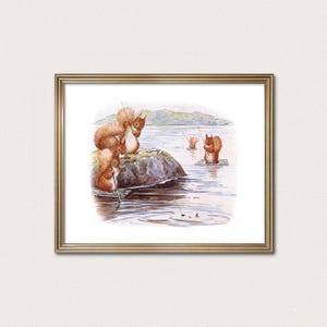 May include: A framed print featuring a watercolor illustration of squirrels fishing in a lake. Several squirrels are gathered on a rock, while others are in the water, all holding fishing rods. The artwork has a whimsical, storybook style.