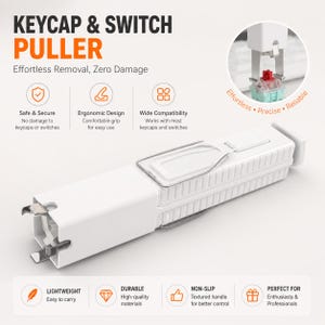 Könnte beinhalten: Ein weißer Keycap- und Switch-Abzieher mit dem Text "KEYCAP & SWITCH PULLER" und "Effortless Removal, Zero Damage". Das Werkzeug hat einen strukturierten Griff und ist für das einfache Entfernen von Keycaps und Switches konzipiert.