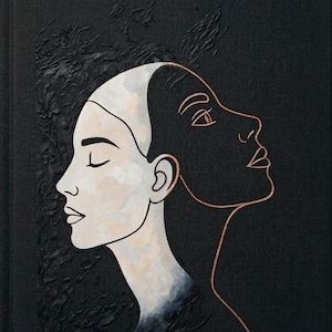 May include: A black book cover with the title "REALIFESTACIÓN" in copper-colored lettering. The cover features a stylized illustration of a woman's face, split into light and dark halves. The text "DESPIERTA TU PODER CREADOR. CREA TU REALIDAD" is also visible.
