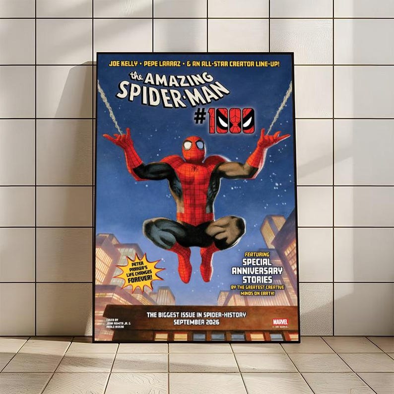 Peut inclure: Une couverture encadr&eacute;e de la bande dessin&eacute;e The Amazing Spider-Man #1000. L'&oelig;uvre d'art repr&eacute;sente Spider-Man dans une pose dynamique sur fond de ciel nocturne. Le texte comprend le num&eacute;ro de l'&eacute;dition, les noms des cr&eacute;ateurs et "Special Anniversary Stories."