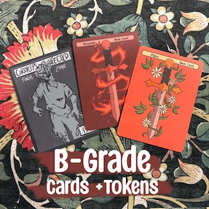 May include: Three fantasy game cards with unique designs. One card features a zombie illustration, another a sword engulfed in flames, and the last a sword entwined with flowers. The cards are labeled "Cordyceps Infected Zombie", "Mountain Basic Land", and "Plains Basic Land". The text "B-Grade Cards + Tokens" is also present.