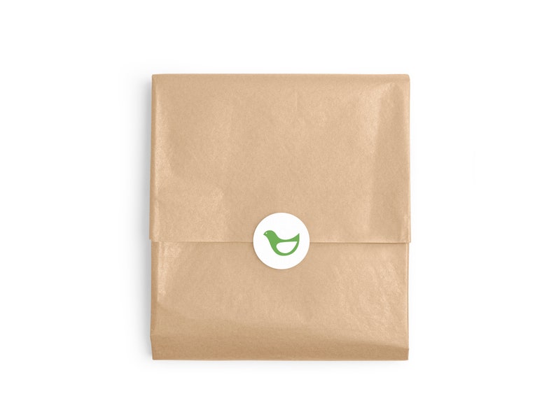 May include: A brown paper package with a white circle sticker featuring a green bird logo.