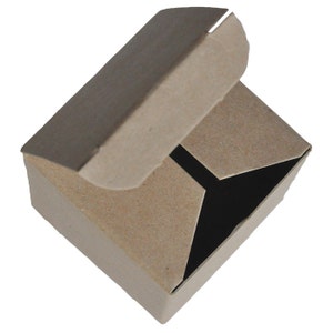 May include: A brown cardboard box with a hinged lid, open to reveal the inside. The box is empty.