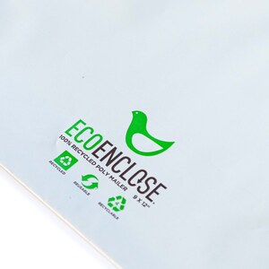 May include: White mailing envelope with a green bird logo and the text "ECOENCLOSE 100% RECYCLED POLY MAILER 9 x 12" and green symbols for recycled, reusable, and recyclable.