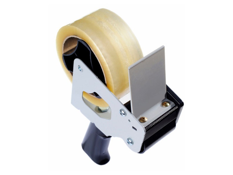 May include: A clear tape dispenser with a black handle and a silver metal frame. The tape is partially unwound and the dispenser has a blade for cutting the tape.
