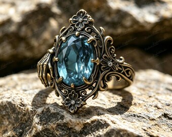 Gothic Skeleton Hand Ring, Oval Lab Created Aquamarine Antique Gold Victorian Halloween Witchy Statement Ring