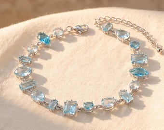 Bracelet en or 18 carats plaqué or et zircon bleu, bracelet en zircon bleu, bracelet à maillons aigue-marine, bracelet en pierres de tailles variées, bijou délicat en or