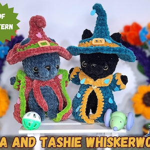 May include: Two plush cat dolls in wizard costumes. One is blue with a red hat and green accents, the other is black with a blue hat and gold accents. The text "PDF PATTERN" is in a green circle. The text "KIRA AND TASHIE WHISKERWOOD" is at the bottom.