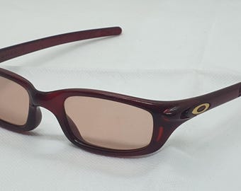 Oakley Four Crystal Red Vintage solglasögon. Tillverkade i USA.