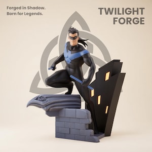 May include: A Nightwing action figure in a dynamic pose, clad in a black and blue suit, holding blue batons. The figure is set against a stylized cityscape and a gray stone structure. Text reads "Twilight Forge" and "Forged in Shadow. Born for Legends."