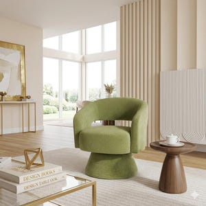May include: A modern, olive green swivel chair with a rounded back and armrests. The chair sits on a pedestal base. A small, round, wooden side table with a white teacup and saucer is next to the chair. The room has a neutral color palette.