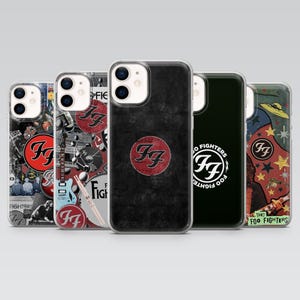 May include: A collection of five phone cases featuring the Foo Fighters logo and various designs. The cases display the band's logo in red and white, along with other graphics. The cases are clear and black.