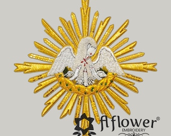 Emblema de pelicano feito à mão