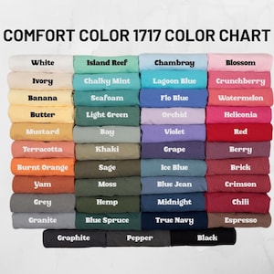 May include: A Comfort Colors 1717 colour chart showing a range of t-shirt shades. The chart includes colours such as white, ivory, banana, butter, mustard, terracotta, burnt orange, yam, grey, granite, island reef, chalky mint, seafoam, light green, bay, khaki, sage, moss, hemp, blue spruce, graphite, pepper, black, chambray, lagoon blue, flo blue, orchid, violet, grape, ice blue, blue jean, midnight, true navy, blossom, crunchberry, watermelon, heliconia, red, berry, brick, crimson, chili, and espresso.