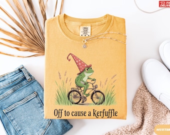 Off to Cause a Kerfuffle Frog Shirt, Wizard Frog on Bicycle Tee, Comfort Colors Cottagecore Frog Tshirt, Funny Toad Gift,Whimsical Magic Top