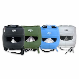 May include: Four boxing headgear pieces in black, green, blue, and white. Each headgear has the brand name "FADI" printed on the front. The headgear has a face opening and adjustable straps for a secure fit. The headgear is designed for protection during training and competition.