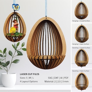 Può includere: Decorazioni a forma di uovo in legno tagliate al laser con varie opzioni di layout. L'immagine mostra versioni sospese e in piedi, con superfici chiuse e aperte. Le dimensioni disponibili sono S, M e L. Spessori del materiale: 2, 2,5 e 3 mm.