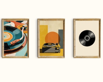 May include: Set of three framed art prints featuring retro-style illustrations of turntables and vinyl records. The artwork uses a vibrant color palette of teal, orange, yellow, and black, with gold-colored frames. The prints are displayed against a white background.