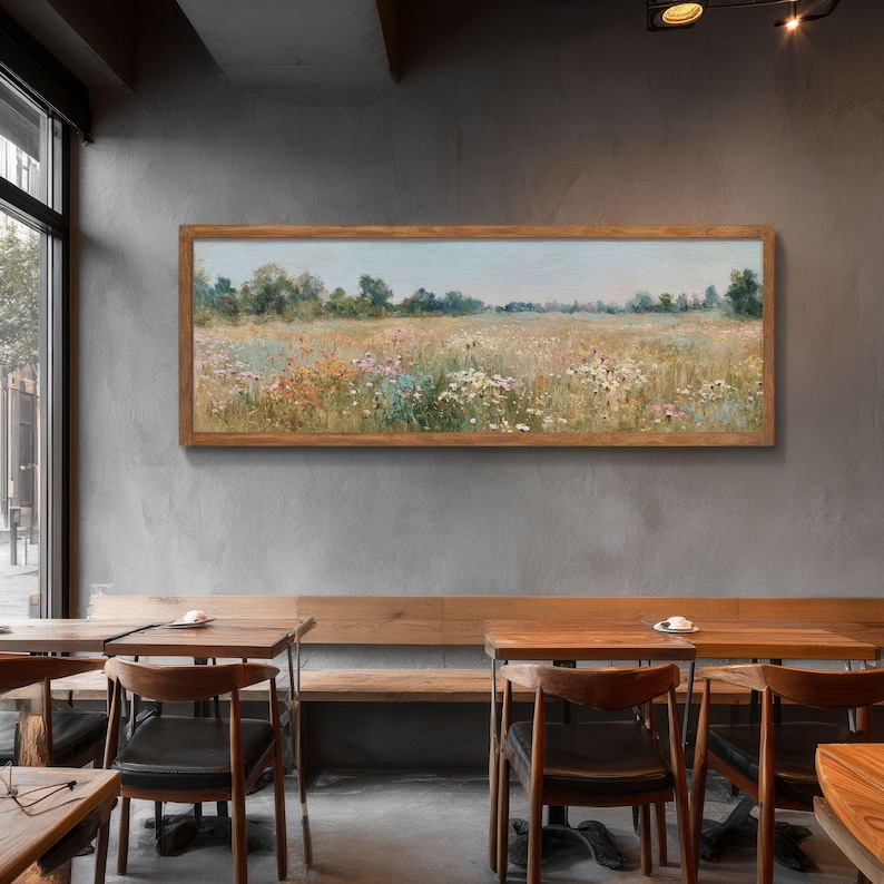 Colorful flower meadow painting for farmhouse spaces — airy cottagecore landscape with golden grasses and vintage charm