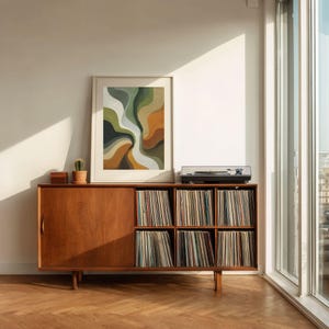 Swirling topographic artwork poster — layered undulating design in warm burnt orange and deep teal