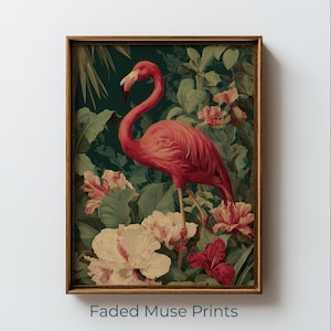 May include: A framed wall art print featuring a vibrant pink flamingo standing amidst lush dark green foliage and large white and red hibiscus flowers. The artwork is enclosed in a thin brown wooden frame. The text Faded Muse Prints is below.