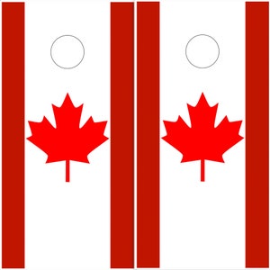 May include: Two white cornhole boards with red stripes and a red maple leaf design. Each board has a white circle in the centre.