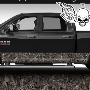 May include: Black pickup truck with a camouflage design on the lower portion of the doors. The truck has a "RAM 2500" logo on the side. A skull with wings is shown in the upper right corner of the image.