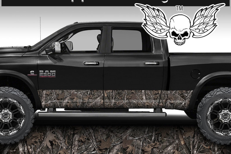 May include: Black pickup truck with a camouflage design on the lower portion of the doors. The truck has a "RAM 2500" logo on the side. A skull with wings is shown in the upper right corner of the image.