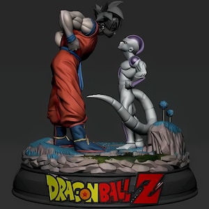 Puede incluir: Figura detallada con dos personajes de Dragon Ball Z. Un personaje viste un atuendo rojo y azul, frente a un personaje blanco y morado. La base tiene el logo de Dragon Ball Z.
