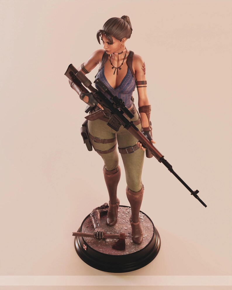 May include: A detailed figurine of a female character holding a rifle, dressed in a blue top, green pants, and brown boots. The figure stands on a circular base with an axe. The figurine has a tattoo on her arm.
