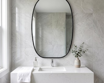 ミニマルなピル型ミラー、ブラックメタルオーバルウォールミラー、モダンなバスルーム化粧台装飾