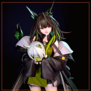 May include: A detailed anime-style figurine of a character with green and black hair, green eyes, and a green and black outfit. The figure is holding a white cat-like figure. The background is dark.