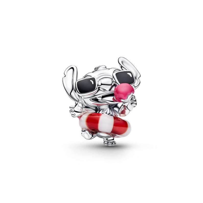 A silver charm in the shape of a cartoon character wearing sunglasses and holding a red and white striped floatie.
