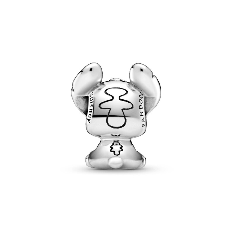 A silver-colored charm in the shape of a small animal, possibly a bunny or a dog, with a stylized design on its head.