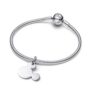 A silver-colored bracelet with a charm featuring the iconic Mickey Mouse logo.
