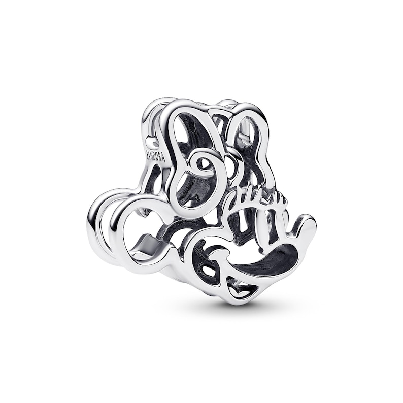 A silver-colored charm bracelet with an intricate, abstract design.