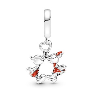 A silver charm bracelet with a heart-shaped clasp and a playful design featuring a character resembling Mickey Mouse.