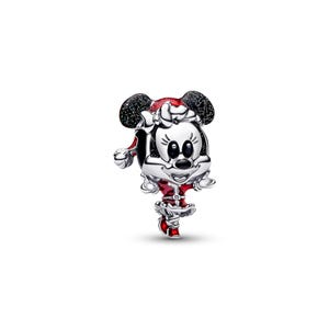 A Minnie Mouse charm in a red and silver color scheme, with glittery ears and a red bow on its head.