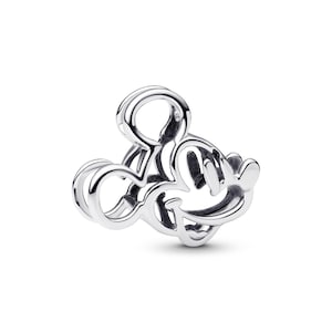 A silver-colored charm in the shape of a cartoon character, resembling Mickey Mouse.