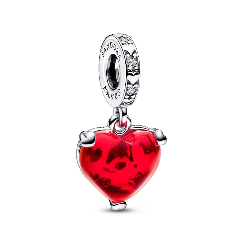 A red heart-shaped charm with a silver pendant attached to it.